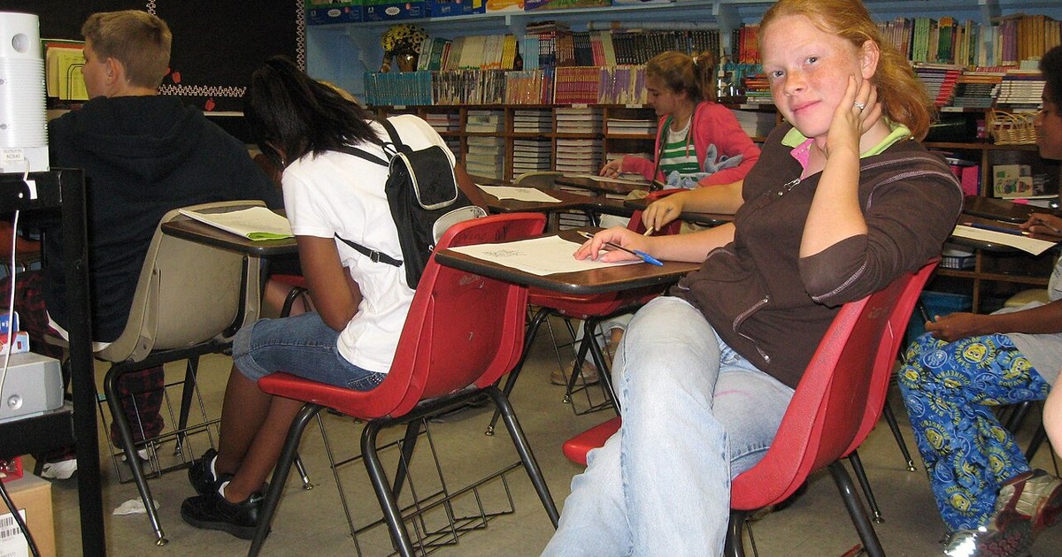Students studying in classrooms